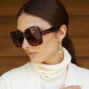 Jackie Mack Lumi Earrings Twist Hoops Gold Cubic Zirconia Curateur Fall 2024